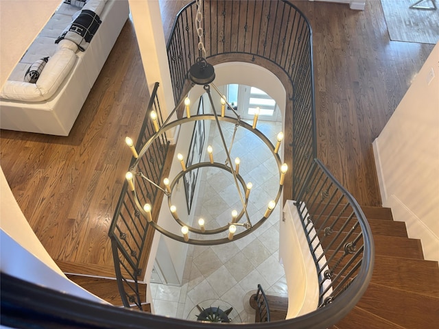 607 Oakley St Unit 5, Houston, TX 77006 - stairs with a chandelier and arched walkways