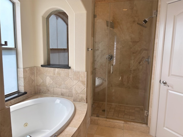 607 Oakley St Unit 5, Houston, TX 77006 - bathroom featuring a bath and a stall shower
