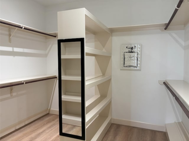 607 Oakley St Unit 5, Houston, TX 77006 - walk in closet with light wood finished floors