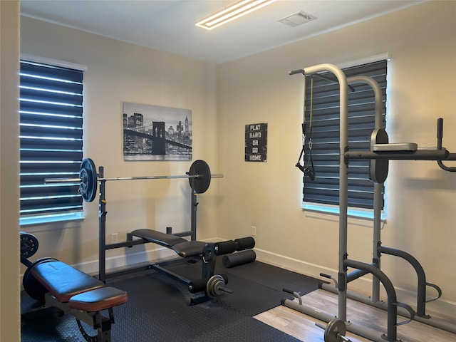 607 Oakley St Unit 5, Houston, TX 77006 - exercise area featuring baseboards