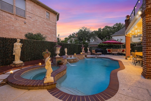 3402 Haywood Ct, Sugar Land, TX 77478 - view of pool featuring outdoor lounge area, a pool with connected hot tub, a patio, and a fenced backyard