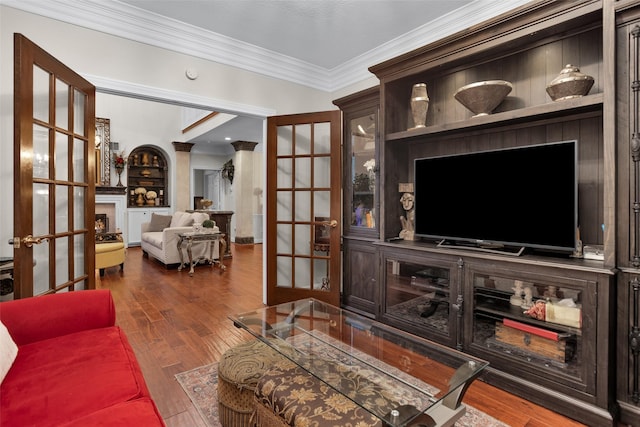 3402 Haywood Ct, Sugar Land, TX 77478 - living area with french doors, crown molding, and wood finished floors