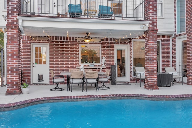 3402 Haywood Ct, Sugar Land, TX 77478 - swimming pool featuring a patio area, a ceiling fan, and outdoor dining area
