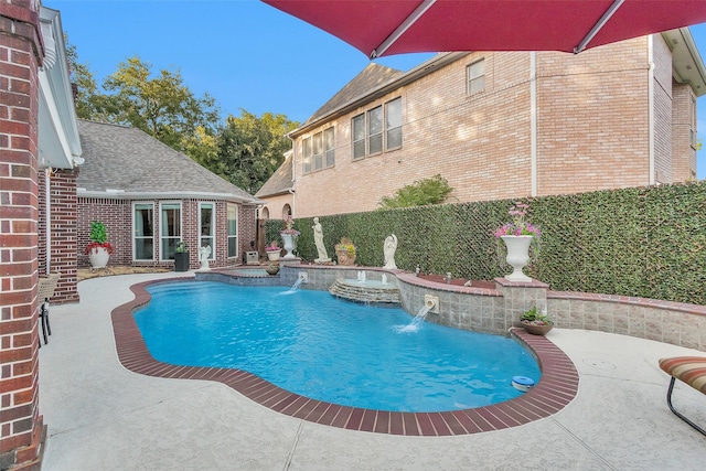 3402 Haywood Ct, Sugar Land, TX 77478 - view of swimming pool featuring a pool with connected hot tub and a patio area