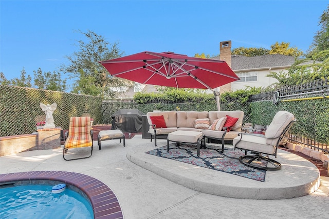 3402 Haywood Ct, Sugar Land, TX 77478 - fenced backyard with an outdoor hangout area, grilling area, and a patio