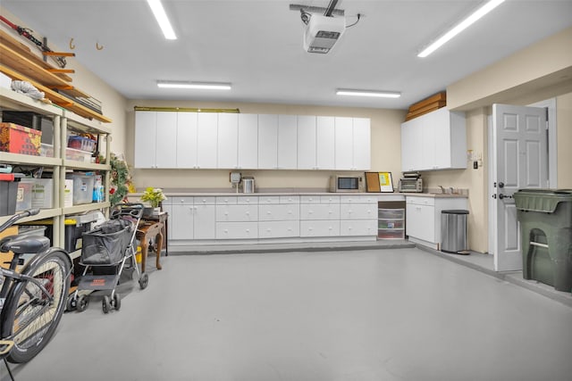 3402 Haywood Ct, Sugar Land, TX 77478 - garage with a garage door opener