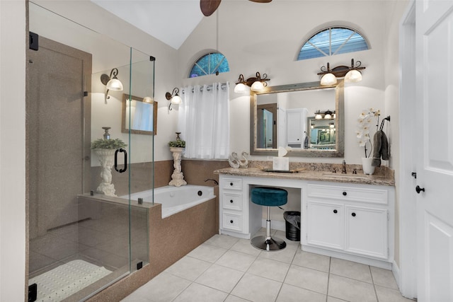 3402 Haywood Ct, Sugar Land, TX 77478 - full bathroom featuring a garden tub, vanity, a shower stall, tile patterned flooring, and vaulted ceiling