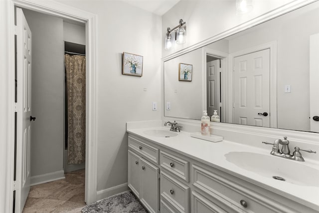 3402 Haywood Ct, Sugar Land, TX 77478 - full bath with double vanity and baseboards