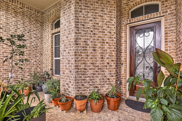 18115 Stari Most Ln, Houston, TX 77044 - doorway to property featuring brick siding