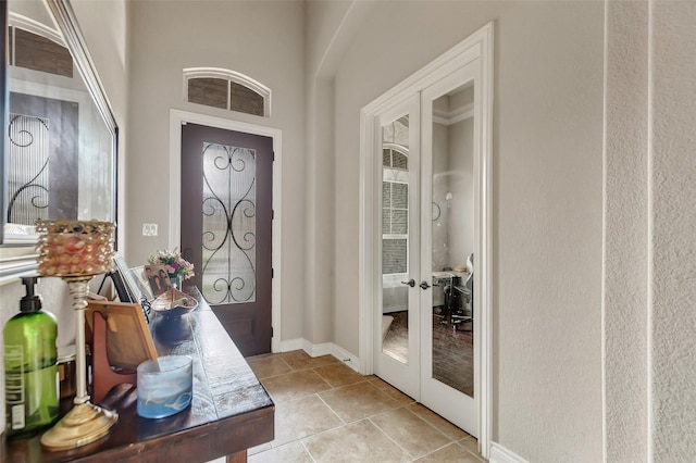 18115 Stari Most Ln, Houston, TX 77044 - entryway featuring french doors and light tile patterned flooring