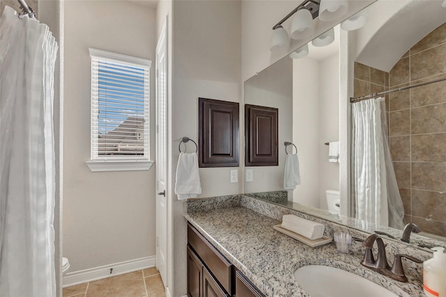 18115 Stari Most Ln, Houston, TX 77044 - bathroom with vanity, a tile shower, and tile patterned flooring