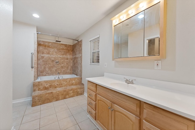 1503 Briar Cliff St, Conroe, TX 77385 - bathroom featuring vanity, tile patterned flooring, and tiled shower / bath
