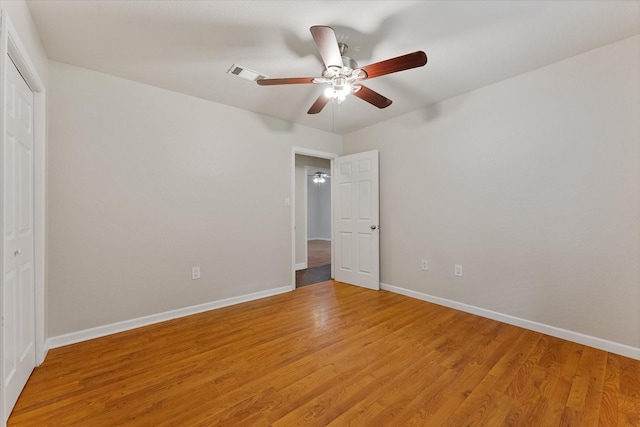 1503 Briar Cliff St, Conroe, TX 77385 - unfurnished bedroom with light wood-style flooring, a closet, and ceiling fan