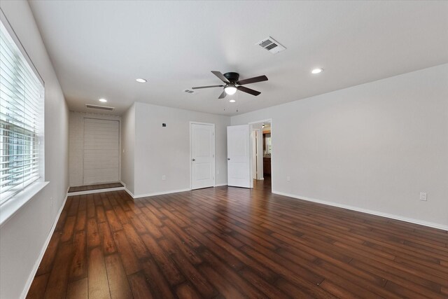 1503 Briar Cliff St, Conroe, TX 77385 - empty room featuring dark wood-style flooring, recessed lighting, and a ceiling fan