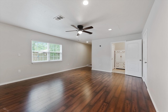 1503 Briar Cliff St, Conroe, TX 77385 - empty room with a ceiling fan, dark wood finished floors, and recessed lighting