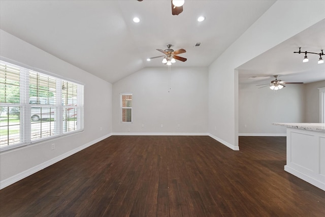1503 Briar Cliff St, Conroe, TX 77385 - unfurnished living room with ceiling fan, dark wood-type flooring, lofted ceiling, and recessed lighting