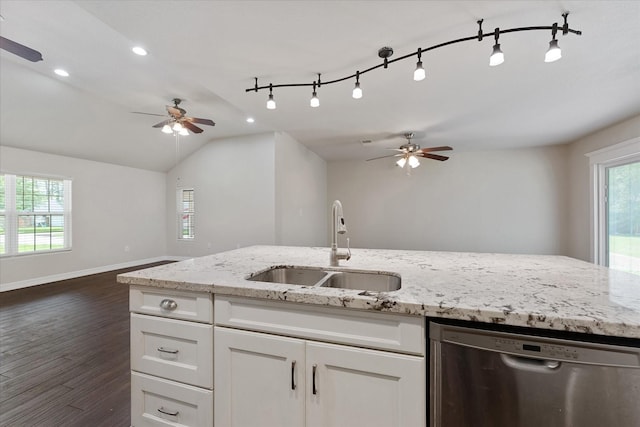 1503 Briar Cliff St, Conroe, TX 77385 - kitchen featuring dishwasher, ceiling fan, open floor plan, dark wood-style floors, and white cabinetry
