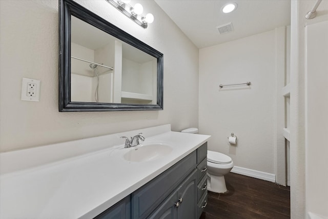 1503 Briar Cliff St, Conroe, TX 77385 - bathroom with wood finished floors, vanity, a shower, and recessed lighting