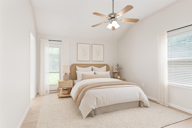 1503 Briar Cliff St, Conroe, TX 77385 - bedroom with lofted ceiling, light wood finished floors, and ceiling fan