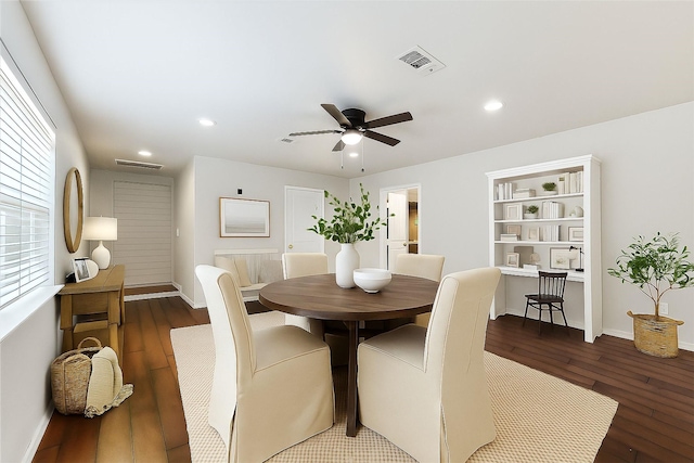 1503 Briar Cliff St, Conroe, TX 77385 - dining area with dark wood-style floors, a ceiling fan, and recessed lighting