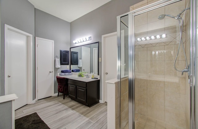 14022 Cypress Falls Dr, Cypress, TX 77429 - bathroom with vanity, a shower stall, and wood finished floors
