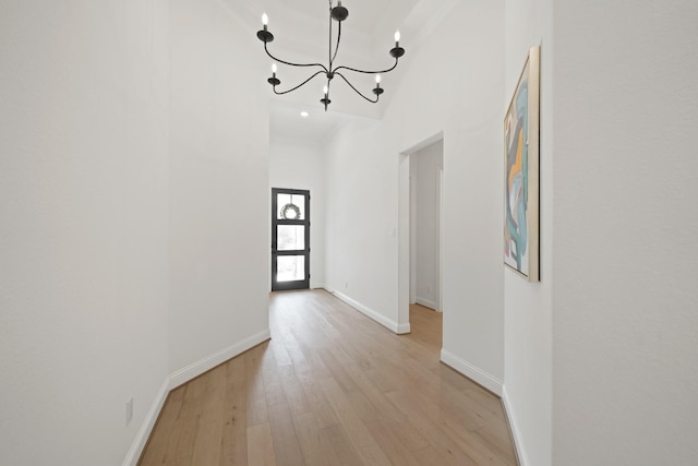 24914 Heather Glade Trl, Tomball, TX 77375 - unfurnished dining area featuring light wood finished floors and a chandelier