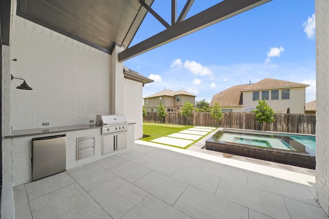 24914 Heather Glade Trl, Tomball, TX 77375 - view of patio with area for grilling and a pool with connected hot tub