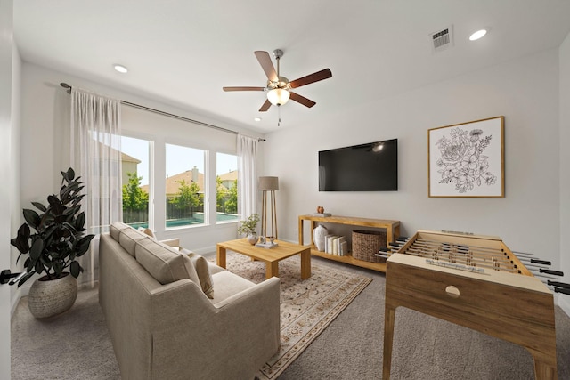 24914 Heather Glade Trl, Tomball, TX 77375 - carpeted living room with a ceiling fan and recessed lighting