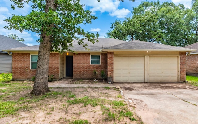 28906 Champion Oaks Dr, Magnolia, TX 77354 - single story home featuring concrete driveway, a garage, and brick siding