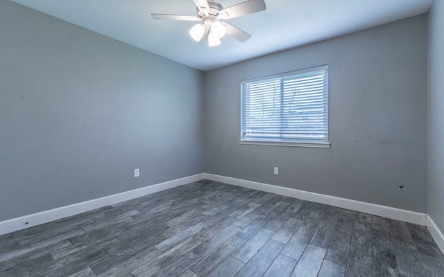 28906 Champion Oaks Dr, Magnolia, TX 77354 - spare room with a ceiling fan and dark wood finished floors