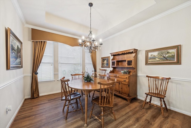 1815 Hanover Springs Ln, Richmond, TX 77406 - dining room with a chandelier, dark wood-type flooring, crown molding, and a raised ceiling