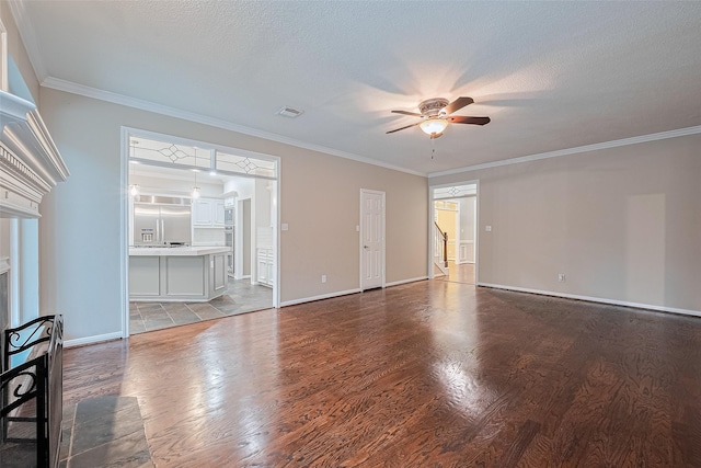 6018 Rapid Creek Ct, Houston, TX 77345 - unfurnished living room featuring a ceiling fan, wood finished floors, crown molding, stairway, and a textured ceiling