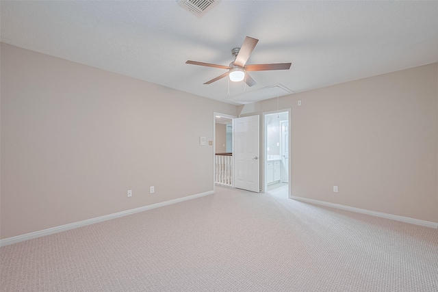 6018 Rapid Creek Ct, Houston, TX 77345 - spare room featuring attic access, a ceiling fan, and light colored carpet