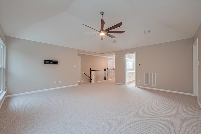 6018 Rapid Creek Ct, Houston, TX 77345 - empty room featuring vaulted ceiling, a ceiling fan, and light colored carpet