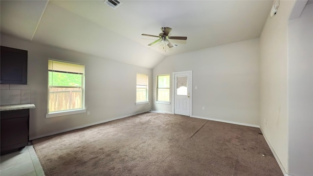 6903 Rosemont Ct, Rosharon, TX 77583 - unfurnished living room featuring plenty of natural light, ceiling fan, light carpet, and vaulted ceiling