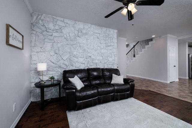 1600 Wimbledon Dr, Huntsville, TX 77340 - living room featuring ceiling fan, wood finished floors, ornamental molding, and stairs