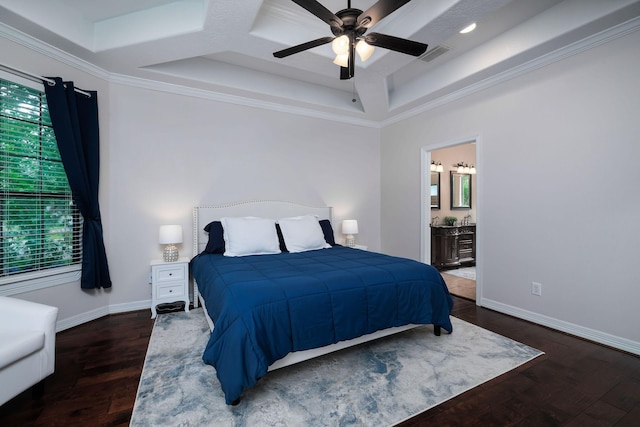 1600 Wimbledon Dr, Huntsville, TX 77340 - bedroom with wood finished floors, crown molding, ensuite bathroom, ceiling fan, and a raised ceiling
