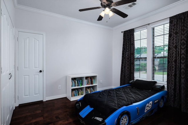 1600 Wimbledon Dr, Huntsville, TX 77340 - bedroom with wood finished floors, crown molding, and a ceiling fan