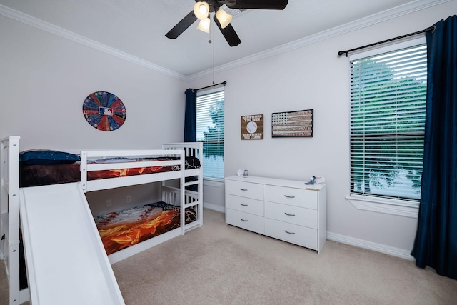 1600 Wimbledon Dr, Huntsville, TX 77340 - bedroom featuring ornamental molding, light carpet, and ceiling fan