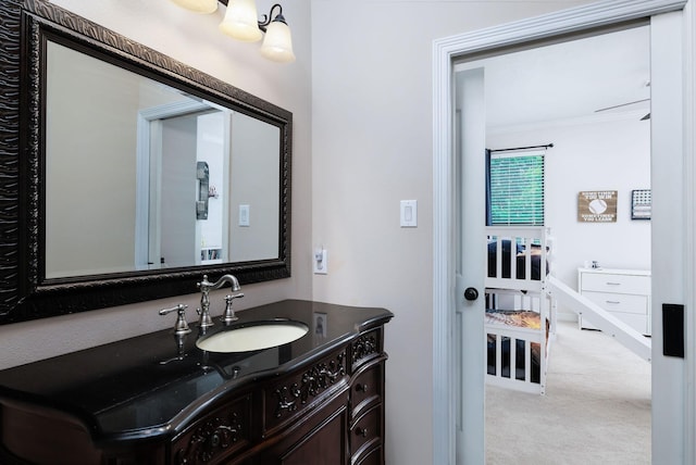1600 Wimbledon Dr, Huntsville, TX 77340 - bathroom with vanity and crown molding