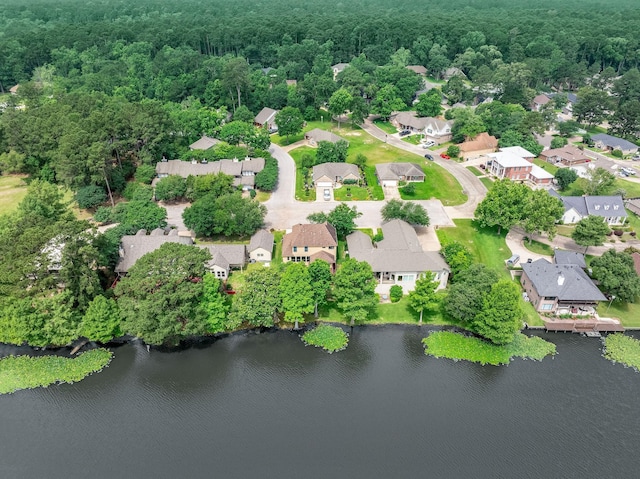1600 Wimbledon Dr, Huntsville, TX 77340 - aerial perspective of suburban area with a forest and a nearby body of water