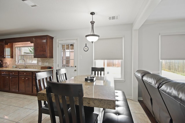 1202 Fairlane Sq, Channelview, TX 77530 - dining room featuring light tile patterned floors