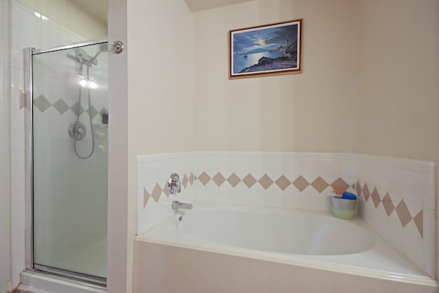 1202 Fairlane Sq, Channelview, TX 77530 - bathroom featuring a stall shower and a garden tub