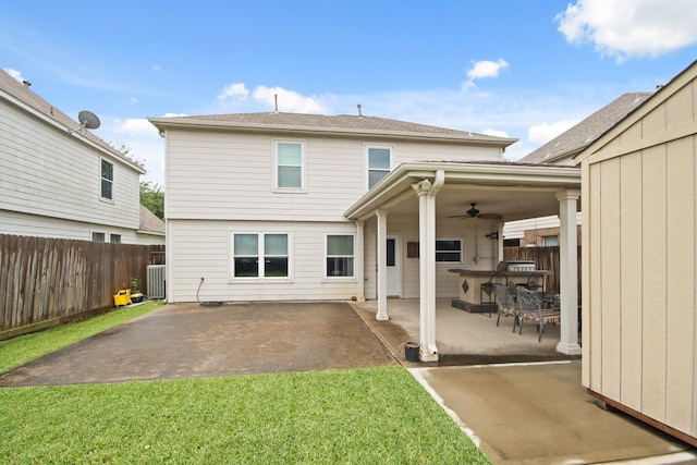 1202 Fairlane Sq, Channelview, TX 77530 - back of house with ceiling fan, a patio area, and a fenced backyard