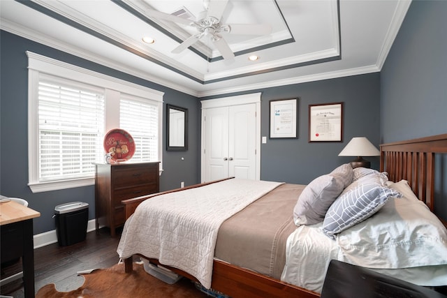 1719 Guese Rd, Houston, TX 77008 - bedroom with a raised ceiling, wood finished floors, a closet, crown molding, and a ceiling fan