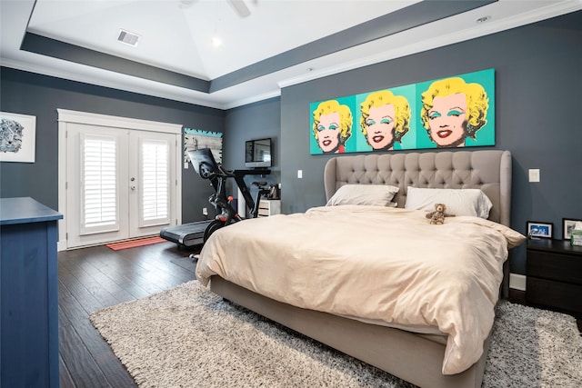 1719 Guese Rd, Houston, TX 77008 - bedroom featuring wood-type flooring, access to outside, a raised ceiling, and ornamental molding