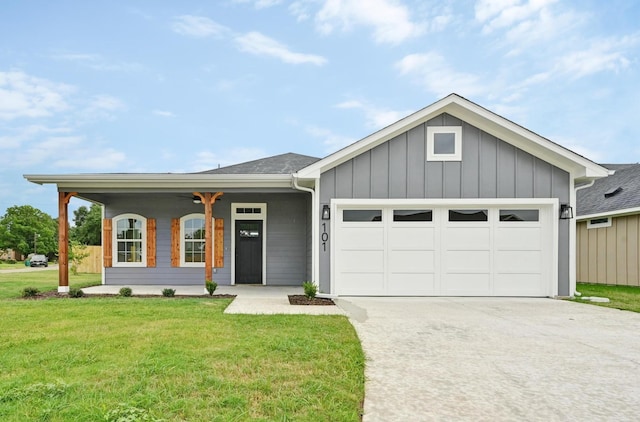 101 Callie St, Smithville, TX 78957 - ranch-style home featuring driveway, an attached garage, a front lawn, board and batten siding, and a porch