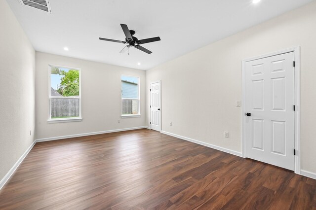 101 Callie St, Smithville, TX 78957 - unfurnished room featuring dark wood finished floors, a ceiling fan, and recessed lighting