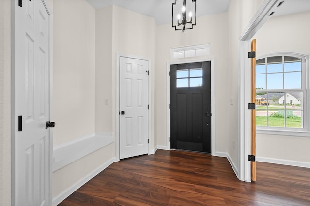 101 Callie St, Smithville, TX 78957 - foyer entrance featuring dark wood-type flooring and a chandelier