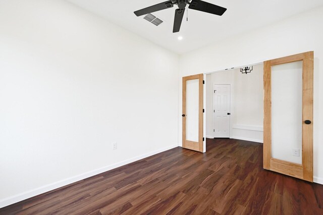 101 Callie St, Smithville, TX 78957 - spare room featuring dark wood-type flooring, ceiling fan, and recessed lighting